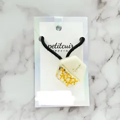 キンモクセイの花を閉じ込めたヘアゴム「Paris」