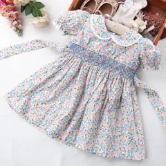 新品 スモッキングワンピース　ブルー系　子供用品　花柄ワンピース　リボン　ハンドメイド　上品　丸襟　発表会　リングガール　半袖　可愛い　コットン100％ 　双子服　 誕生日　　撮影　七五三祝い　お姫様　90,95,100,110cm,120cm,130cm