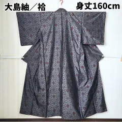 【大島紬 袷】優しい黒地×花柄｜上品な光沢と風合い｜身丈160cm 裄65cm｜名古屋帯・半幅帯にも◎ カジュアル 高級感