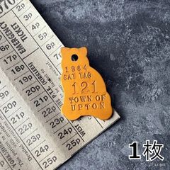 246・R-1853　キャットタグ　アルミ製　オレンジ　1984年　ヴィンテージタグ　ネコ　ヴィンテージ 　レア　アクセサリー　首飾り　キーホルダー　ナンバータグ　猫モチーフ　猫アイテム　アメリカタグ　アメリカ雑貨　直輸入