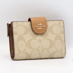 美品 コーチ 折り財布 シグネチャー柄 ベージュ系カラー レディース折り財布 2000000 NSK MTM