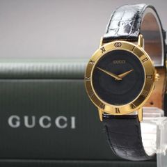 美品はGUCCI ブラック文字盤 ローマンベゼル メンズ 腕時計 新品ベルト