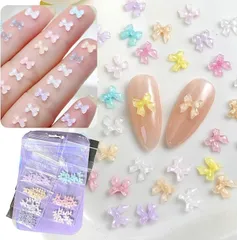 K-Bom ネイルパーツ リボン 小さめ ミニ 3D 立体 7色 10個ずつ 70個セット ネイルアート ワンホンネイル レジン デコパーツ ジェルネイル DIYネイル 蝶々風デザイン アクセサリーパーツ(マルチカラー,  6x6x1mm)