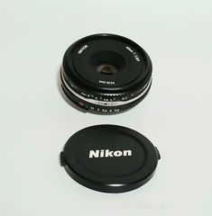 Nikon NIKKOR 45mm F2.8P パンケーキレンズ HN-35付 - メルカリ