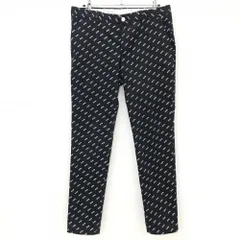 ニューバランスゴルフ パンツ 黒×白 英字総柄 後ろシリコンワッペン メンズ 6(XL) ゴルフウェア New Balance