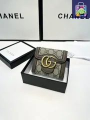 未使用級　GUCCI グッチ　二つ折り財布　GGキャンバス　シマ　型押しロゴ　黒 GUCCI・グッチ・二つ折り財布・GGキャンバス・黒 - メルカリ