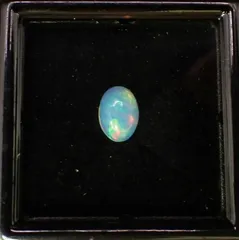 宝石ルース 『魅力的な全面の彩りの斑（ふ）』エチオピア産天然オパール0.541ソ