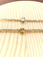 スワロフスキー　華奢なビーズブレスレット2本セット　ゴールド　シルバー