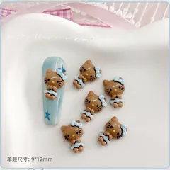 No.902　日焼けハローキティ　青両手姿　ネイルパーツ5個