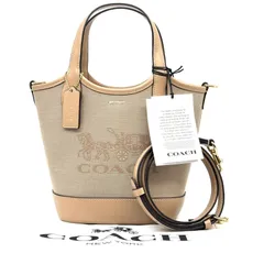 新品未使用タグ付きCOACHハンナ バケットバッグベアチャーム2点セット