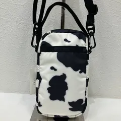 5041 LeSportsac レスポートサック　2way　スマホショルダー　モノクロームカウ　MINI PHONE CROSSBODY ミニフォンクロスボディ　ショルダーバック　ミニ　小さめ　シンプル　ブラック　黒　ホワイト　白　アニマル柄　レディース