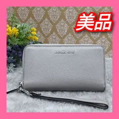 《 MICHAEL KORS 》　★美品★　マイケルコース　スマートフォンウォレット　ジェットセットトラベル　マルチファンクション　長財布　スマホケース　ポーチ　リストレット　ラウンドファスナー　パールグレー　送料無料・匿名配送・最短即日発送いたします！337