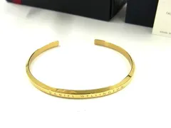 ■美品■ Daniel Wellington ダニエル ウェリントン バングル ブレスレット アクセサリー レディース メンズ ゴールド系 DG9284のサムネイル