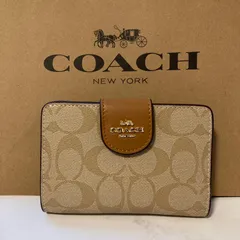 新品　COACH 長財布　コーチ　二つ折り財布　レディース メンズ シグネチャー ベージュのサムネイル