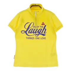 サイズ：M LE COQ GOLF ルコックゴルフ  ハーフジップ 半袖Tシャツ プリント  イエロー系 [240101491674] ゴルフウェア レディース ストスト