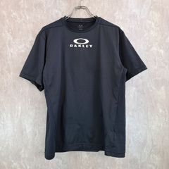 OAKLEY オークリー ブランドロゴプリント 薄手 テロテロ生地 ブラック　黒 XL Tシャツ スポーツウェア