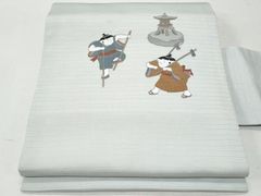 素敵な装い！西陣名古屋帯 綿芯仕立付 「鳥獣人物戯画」 薄グレー