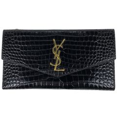 イヴ・サンローラン YVES SAINT LAURENT ロゴ 長財布 型押し 三つ折り財布 札 小銭 カード入れ 長財布 レザー ブラック ブラック レディース 【中古】