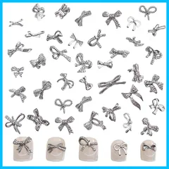 【迅速発送】ネイルパーツ リボン 100個セット 3D立体 蝶結び 蝶々 メタルパーツ シルバー ジュエリーパーツ ハンドメイド ネイルアート デコパーツ DIY ランダム形 (リボン 100pcs)