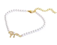 パール ブレスレット リボン ゴールド 細め 可愛い ホワイトパール ワンポイント お洒落 レディース 人気 お洒落 