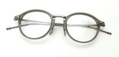 【トムブラウンを代表するグレーカラーの人気モデル】THOM BROWNE（トムブラウン）　UEO011A-068-46 satin crystal grey / matte plate titanium