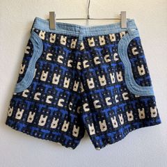 ツモリチサト TUMORI CHISATO ショートパンツ ケーブル編み 総柄 厚手 刺繍 異素材 切り替えアルファベット柄デザインポケットモノグラム 麻 リネン 大きめ