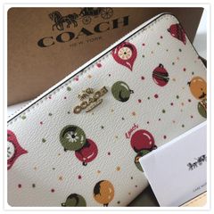 COACH オーナメント プリント ジップアラウンド 長財布 - メルカリ