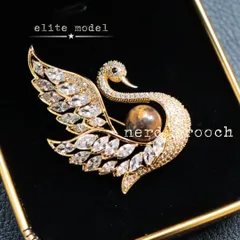 タイガーアイ白鳥のブローチ　天然石 CZジルコニア フォーマル 上品 高級感 大人 新品未使用 お呼ばれ 入学式 卒業式 発表会 生き物 アニマル 動物 コサージュ NerD