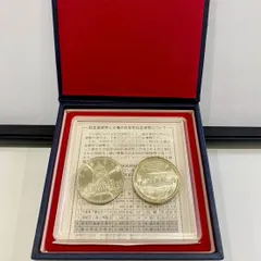 議会開設100周年記念と裁判所制度100周年記念5000円銀貨2枚