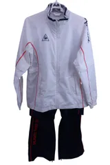 le coq sportif(ルコックスポルティフ) ウィンドブレーカー上下セット 白ネイビー レディース M ゴルフ用品 2505-0995 中古