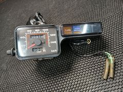 ② モトコンポ 新品 純正スピードメーターASSY - メルカリ