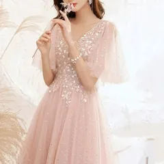 小花柄の様なオシャレなデザインの袖ありチュールドレス?.?