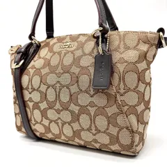 ✨良品✨ COACH コーチ 2way ショルダーバッグ トートバッグ シグネチャー 総柄 馬車金具 チャーム 肩掛け 斜め掛け キャンバス レザー レディース ベージュ 肌色 ブラウン 茶色