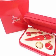 クリスチャンルブタン　シルキーサテン カスタマイズ バニティ キット ルージュルブタン シルキーサテン My Orange 555 - Christian