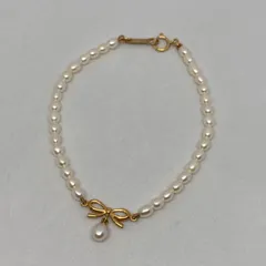 【中古】 TASAKI （タサキ） K18YG ﾘﾎﾞﾝ ﾍﾞﾋﾞｰﾊﾟｰﾙ ﾌﾞﾚｽﾚｯﾄ ブランドジュエリー ブレスレット/バングル/アンクレット  Goldのサムネイル