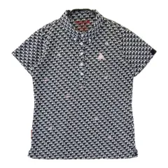 サイズ：L LE COQ GOLF ルコックゴルフ  半袖ポロシャツ ボタンダウン 総柄 ブラック系 [240101448111] ゴルフウェア レディース ストスト