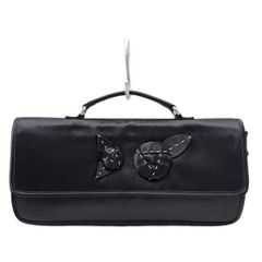 PRADA(プラダ) ハンドバッグ美品  - 黒 ドライアングルプレート/フラワー(花)