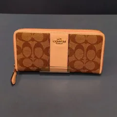 M9 コーチ　未使用品　シグネチャー　ロングジップウォレット　ピンク系　収納力が高いお財布