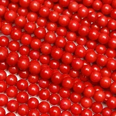 【TOP】赤珊瑚 サンゴ ルース 両穴 9.1g ネックレス ブレスレット 羽織紐 数珠 念珠 根付 e457 日本の石 鎌倉石 勾玉 30mm 神奈川県 天然石 パワーストーン レディース メンズ