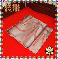 【袋帯】紅藤色に赤い曲線模様の帯
