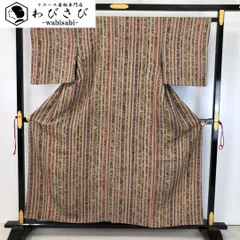 小紋 二代目更甚 縦柄花更紗 亜麻色 縮緬 K-5005 小紋 二代目更甚 縦柄花更紗 亜麻色 縮緬 K-5005 - メルカリ