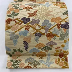 409my16☆袋帯 唐織 七宝 唐花 茶色系☆美品