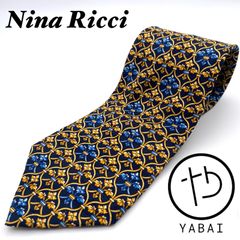 Nina Ricci ニナリッチ　ネクタイ　メデューサ風　濃紺　ダークネイビー　黄色　イエロー　花　フラワー　派手　シルク100%