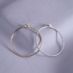 ARGUE ゴールドピアス mizuashi hoop pierce ARGUE ゴールドピアス mizuashi hoop pierce - メルカリ