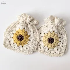【ハンドメイド・手編み】ひまわり咲くコットン巾着・巾着・巾着袋・ポーチ・小物入れ・AirPodsケース・イヤフォンケース・クロシェ編み・ミニギフト・プチプレゼント