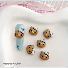 No.902　日焼けハローキティ　青顔　ネイルパーツ5個