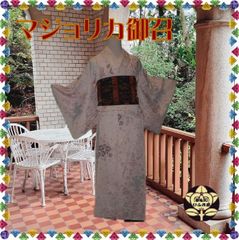 【マジョリカ御召】薄いピンク色にキラキラ百花模様の着物