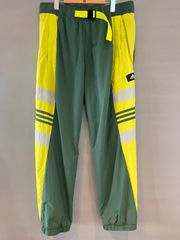 adidas アディダス ナイロンパンツ トラックパンツ オリーブ〜カーキ イエロー 緑 黄 メンズ Oサイズ