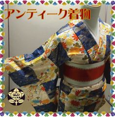 【お召】青と白色の格子模様に百花模様の着物