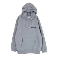 ISAMUKATAYAMA BACKLASH イサムカタヤマバックラッシュ ANONYMOUS アノニマス別注 ロゴプリント プルオーバー フーディ パーカー グレー系 L【中古】のサムネイル